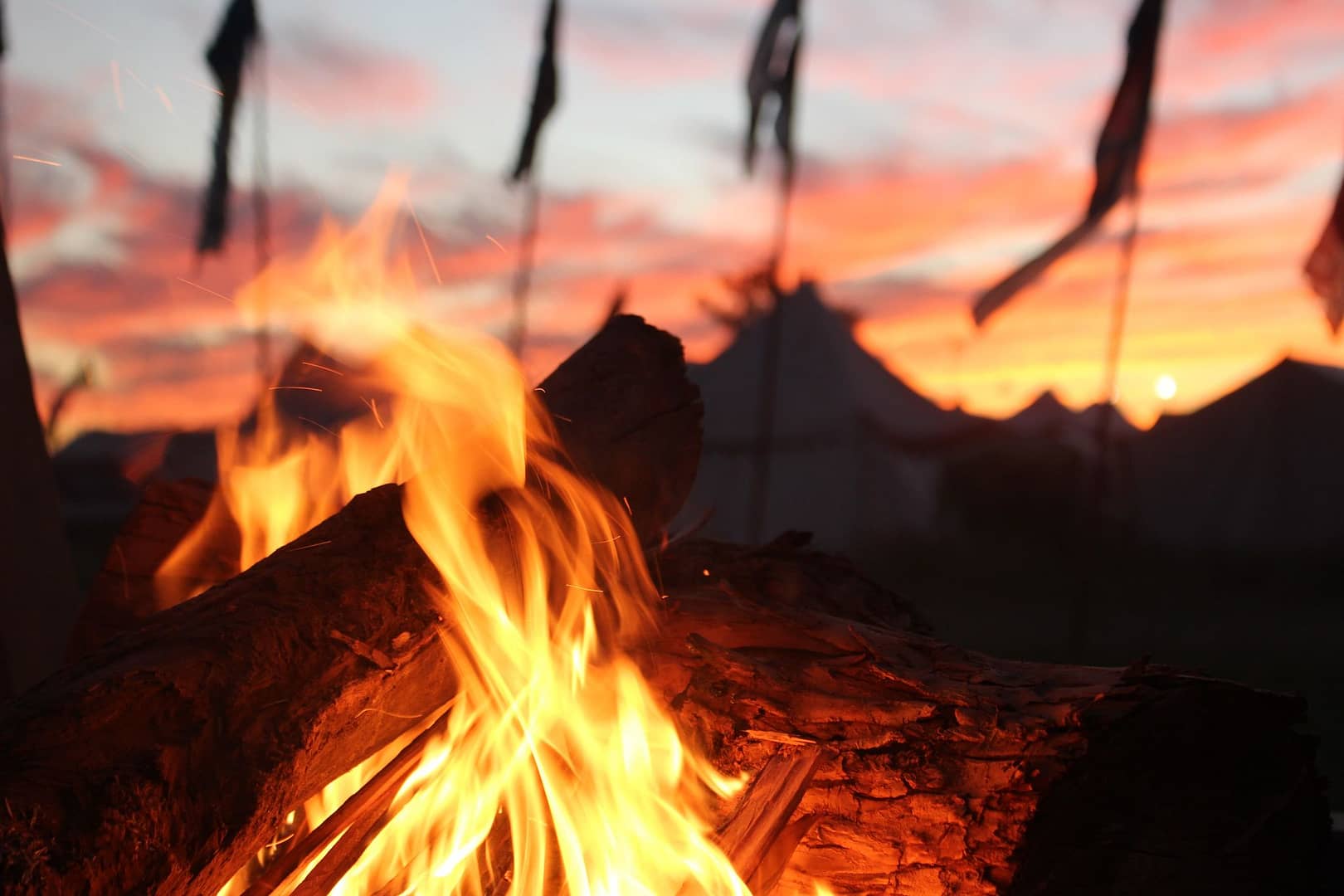 Photo by unknown Hearing the town crier exclaim the latest news by the camp fire.